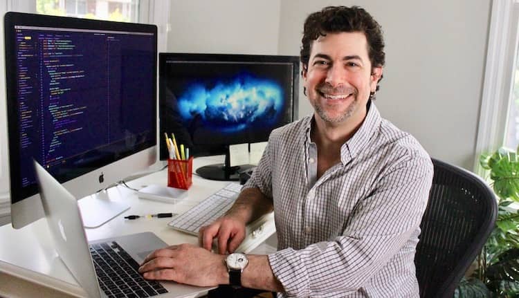 Web Developer Gregg Fine working at his computer
