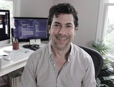 The Code Creative web designer Gregg Fine working in his development studio in New Jersey